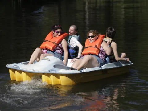 a group of people on a raft
