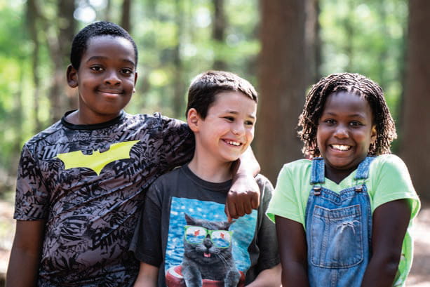 a group of children smiling