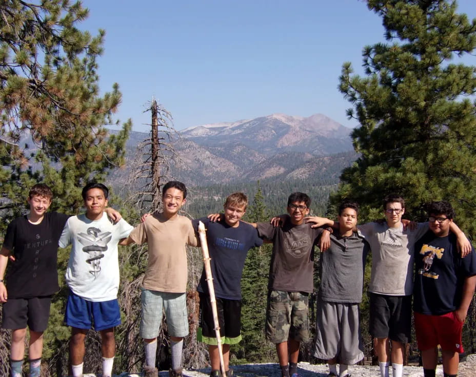 a group of men posing for a picture