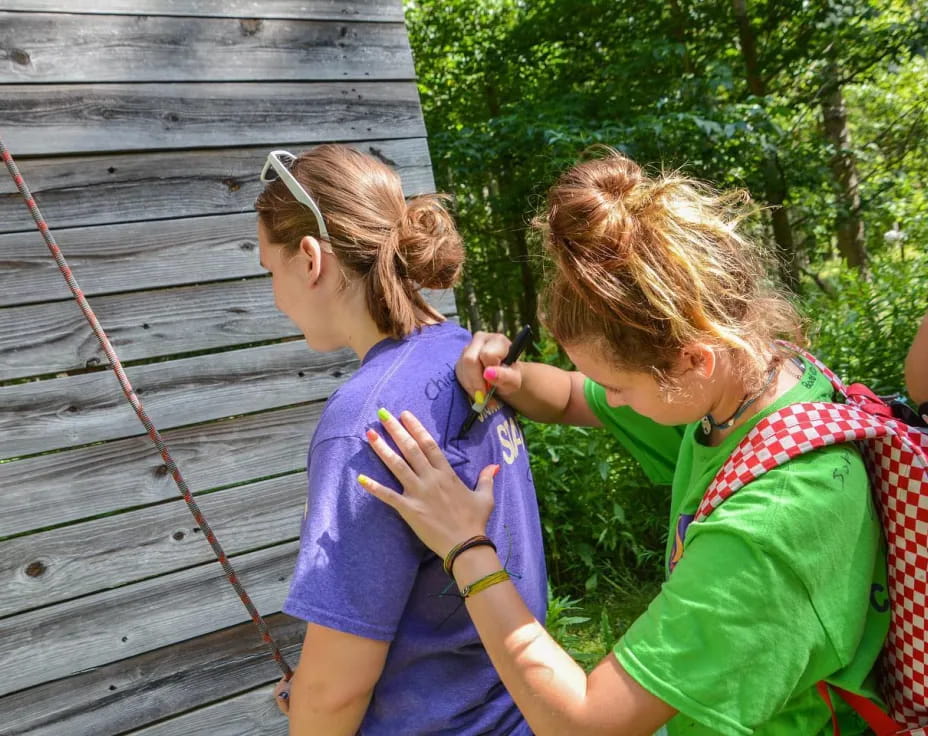a person holding a child