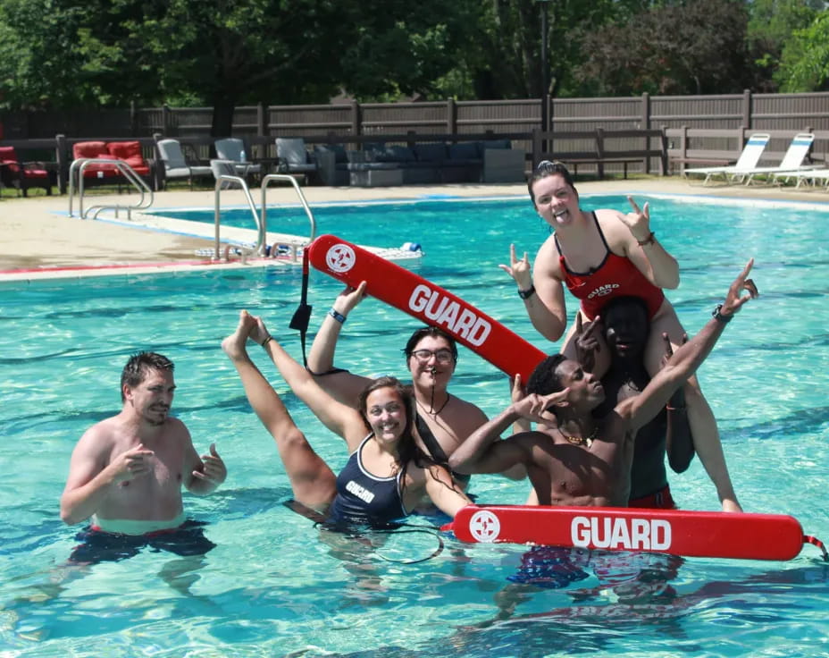 a group of people in a pool