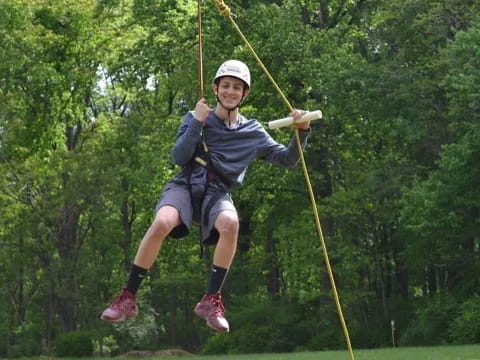 a man holding a bow and arrow
