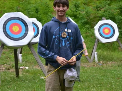 a man holding a shovel