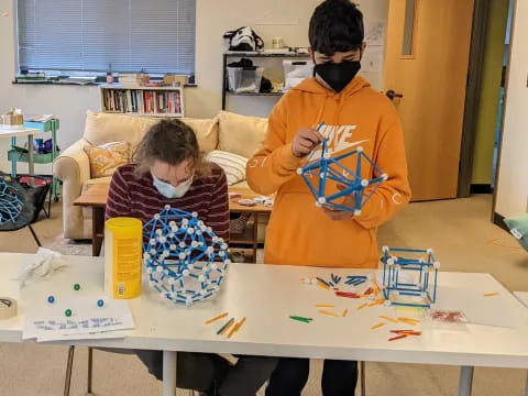 a person and a boy wearing masks