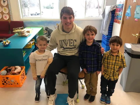 a person and several children