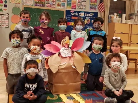 a group of children wearing masks