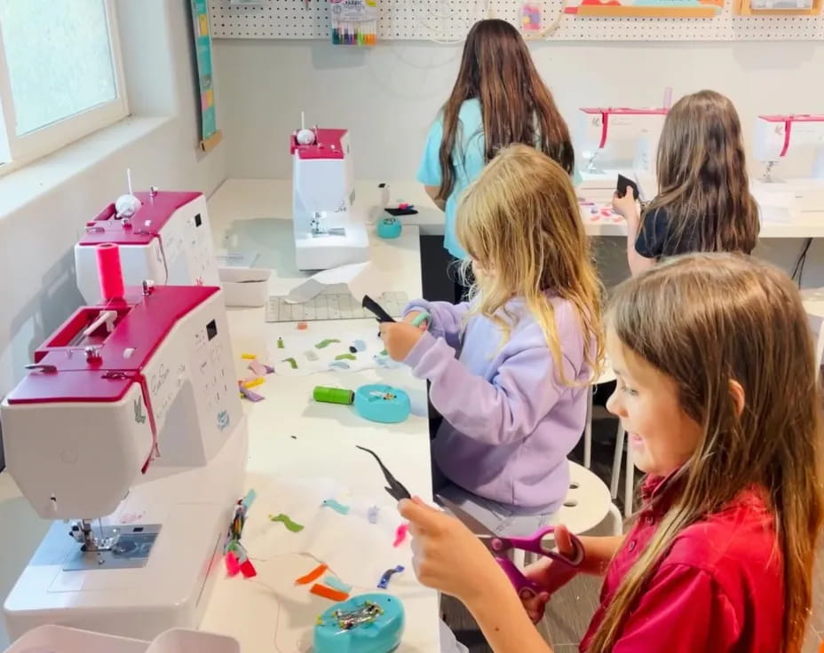 a group of children painting