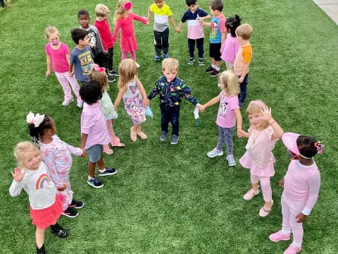 a group of children in a field
