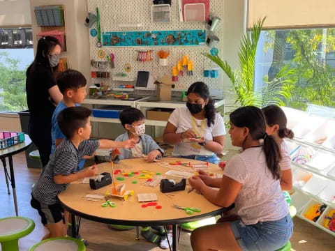 a group of people around a table