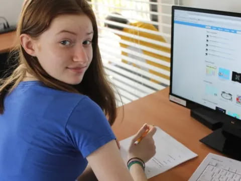 a person sitting at a desk