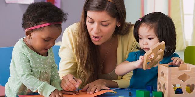 a woman and two children