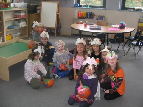a group of children wearing hats