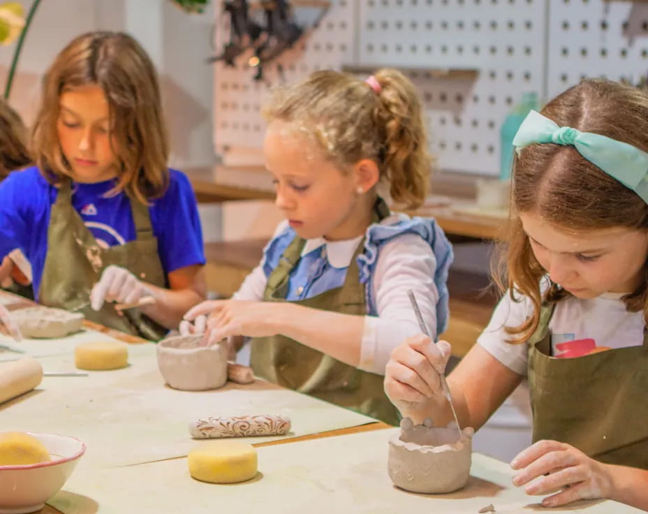 a group of children painting