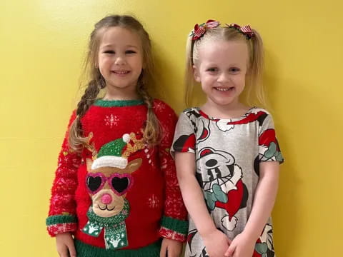 two girls posing for a picture