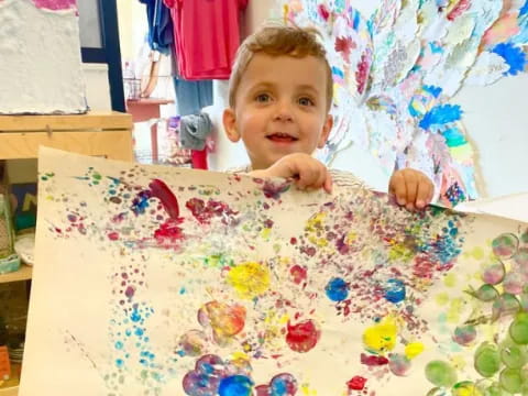 a boy sitting at a table