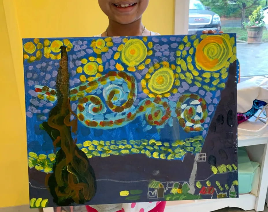 a child wearing a colorful shirt