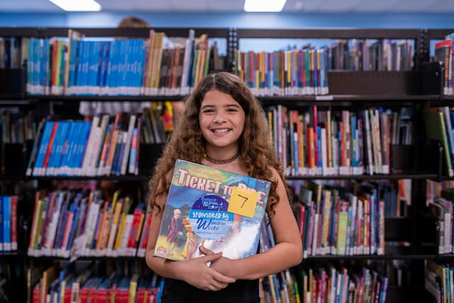 a person holding a book