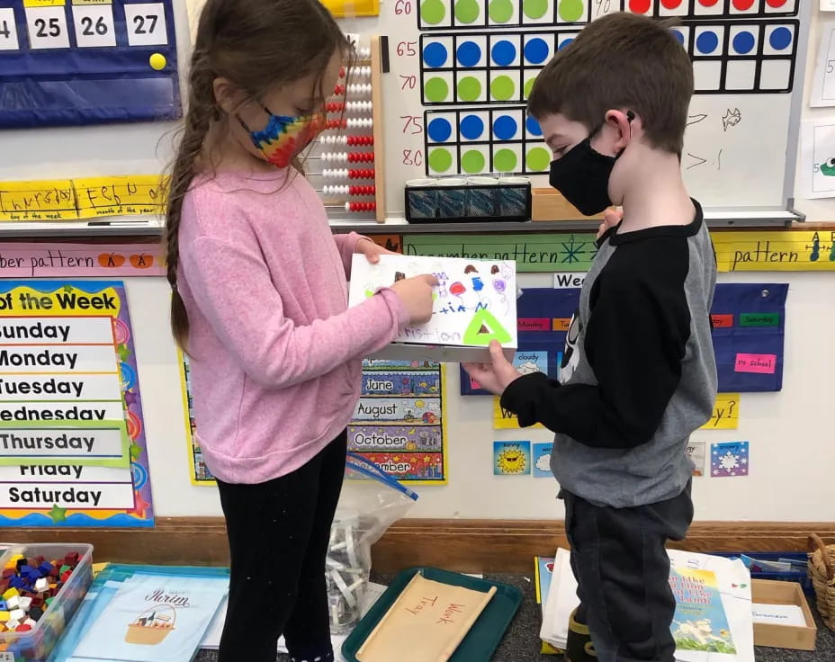 a person and a boy in a store