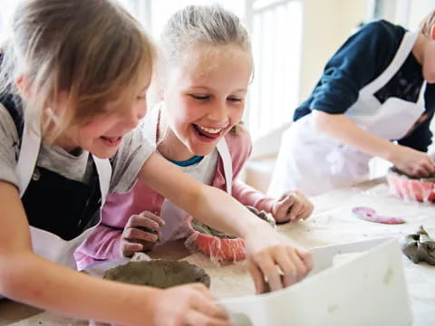 a group of girls making a project