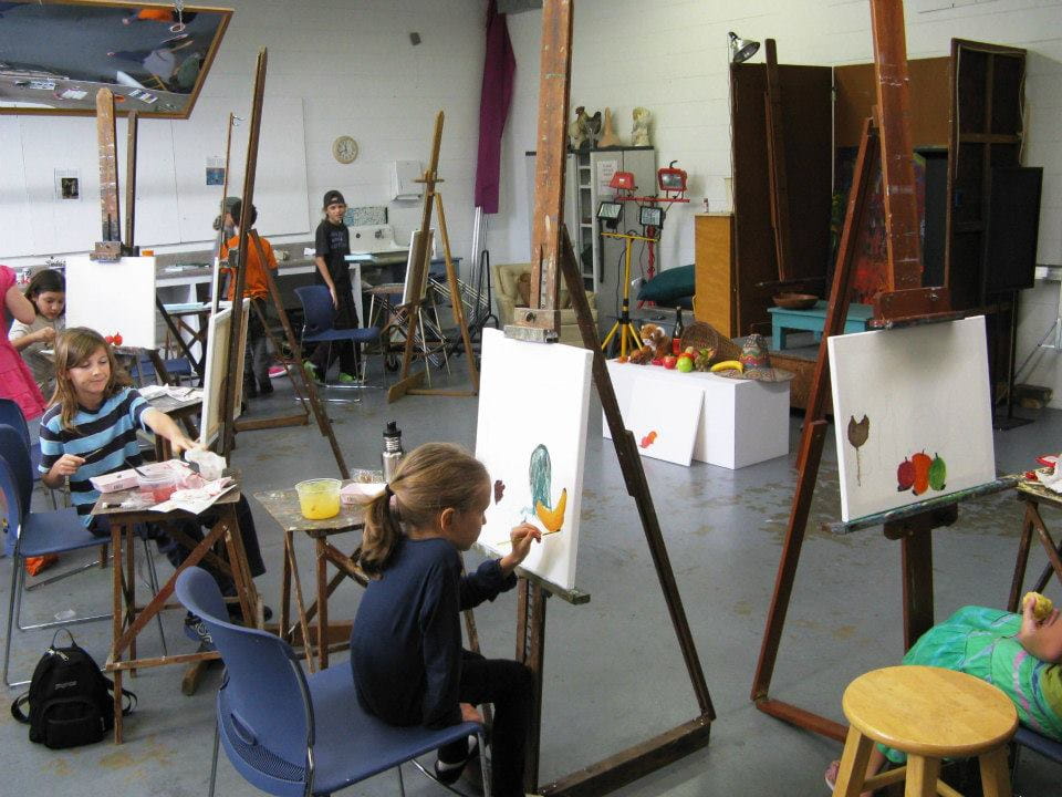 a group of children in a classroom