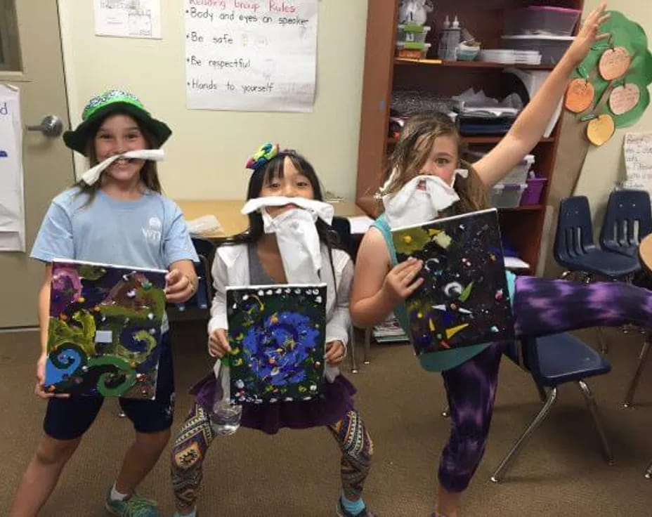 a group of girls wearing clothing