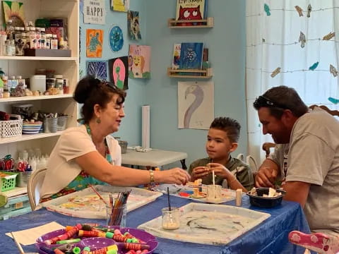a family sits around a table