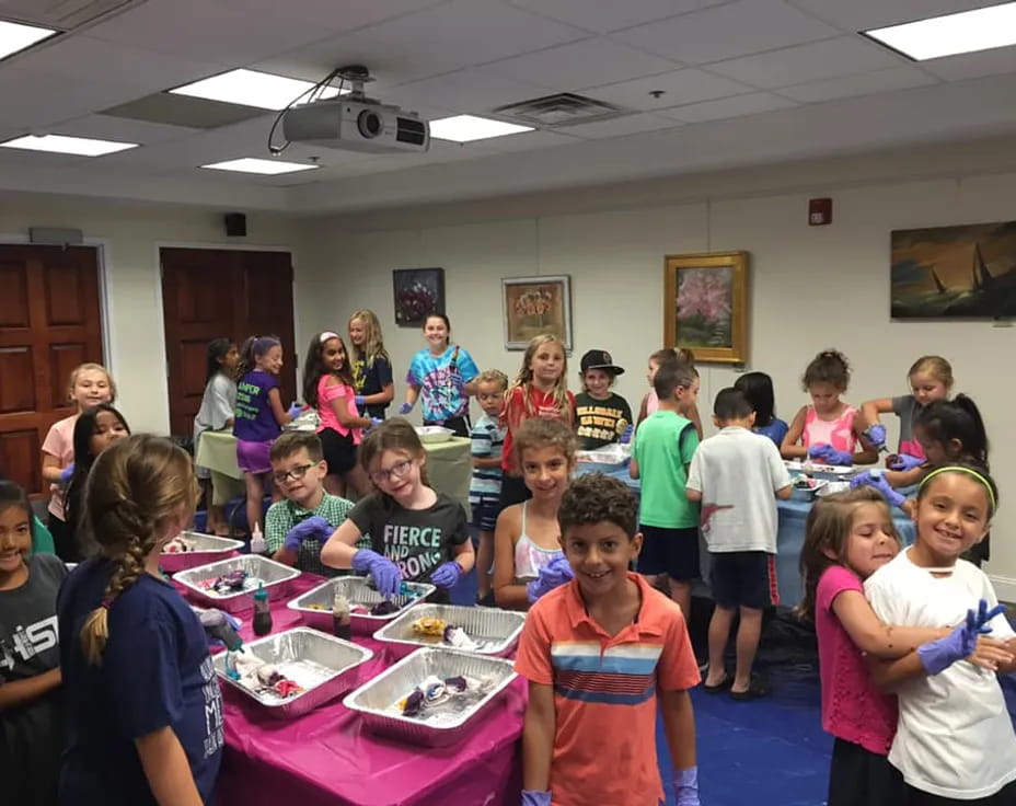 a group of children in a classroom