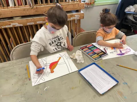 children sitting at a table