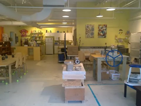 a room with tables and chairs