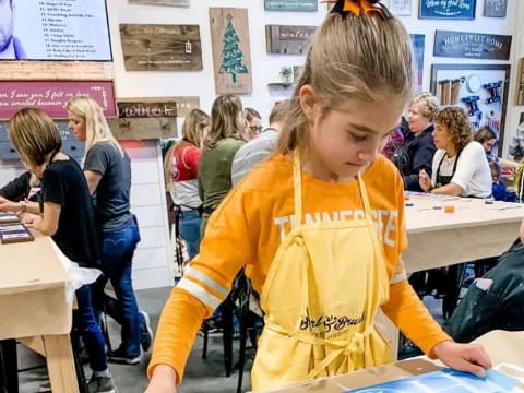 a girl in a yellow shirt