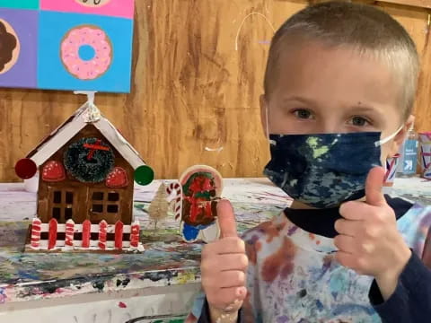 a baby holding a toy