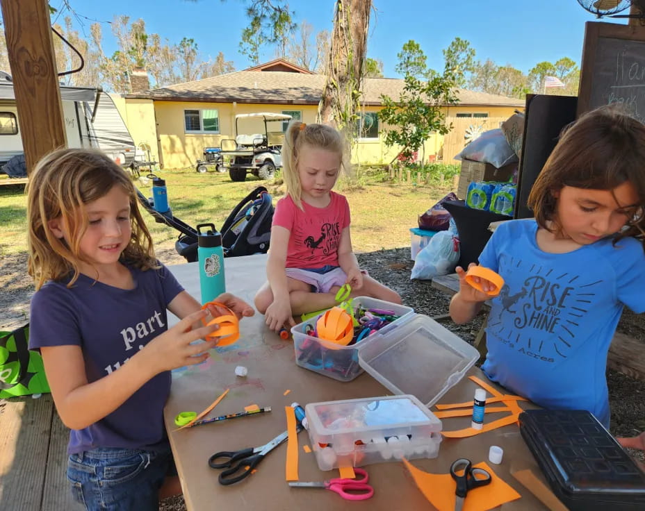 a group of children painting