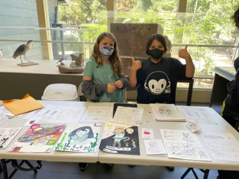 a group of people wearing masks
