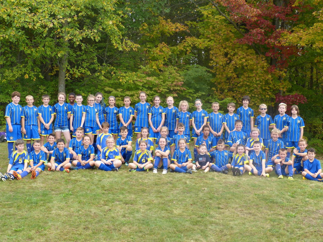 a group of people in blue uniforms