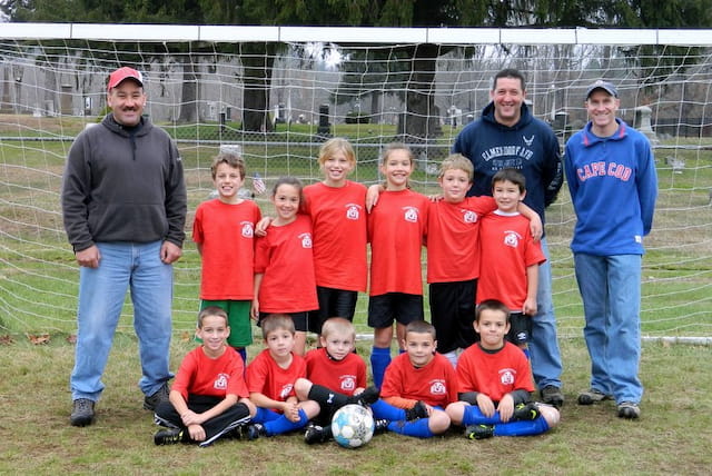 a group of people posing for a photo