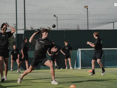 a group of men playing football