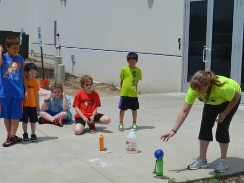 a group of kids playing with toys