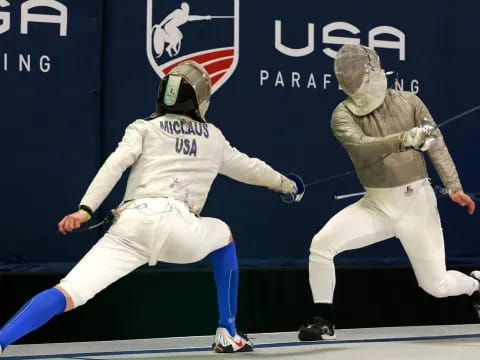 two people in white uniforms