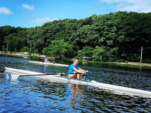 a man sitting on a surfboard