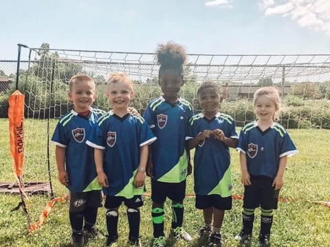 a group of children in uniform