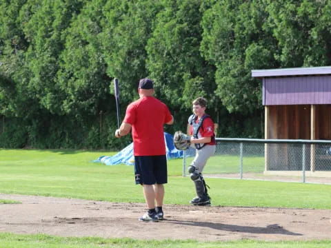 a person holding a baseball bat