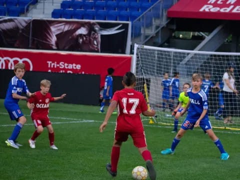 a group of kids playing football