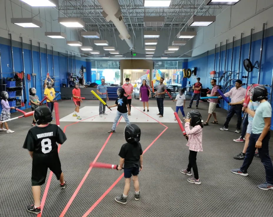 a group of people in a gym