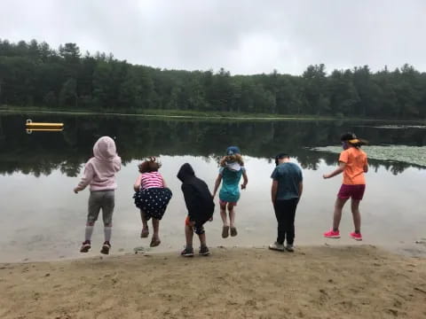 a group of people on a beach