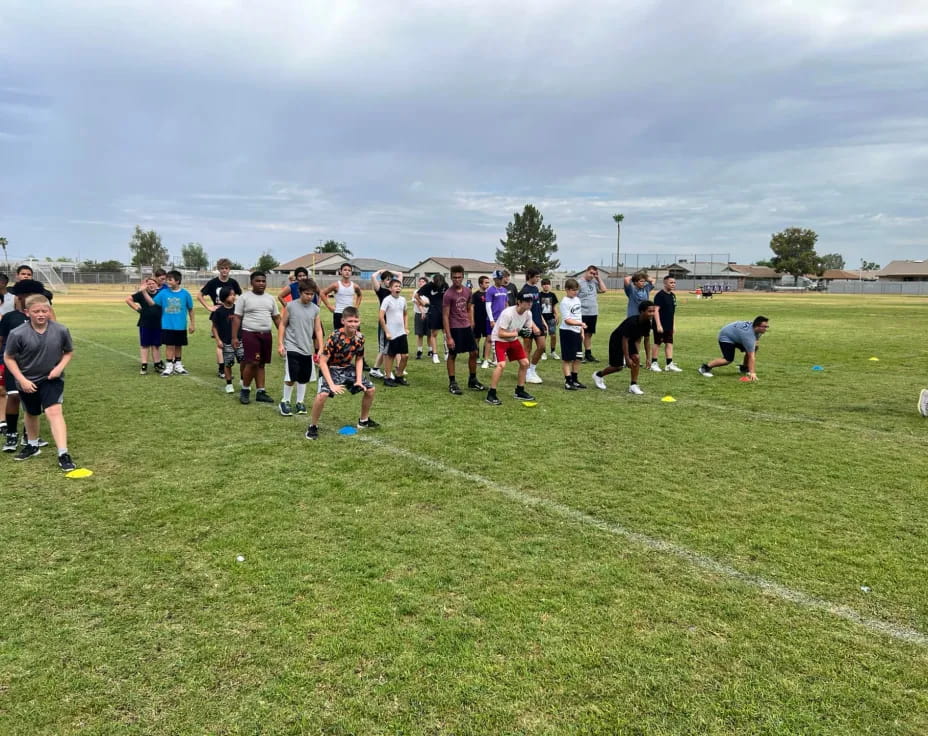 a group of people playing football
