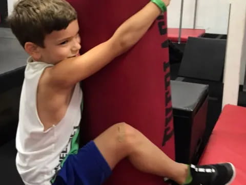 a boy doing a push up