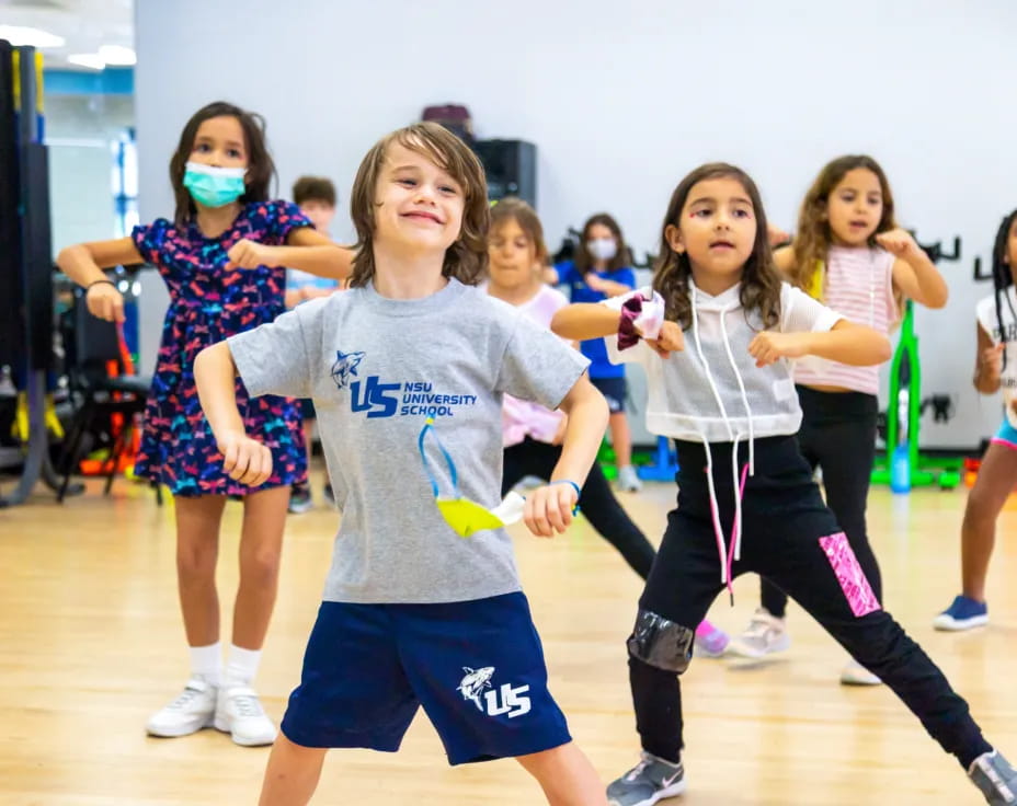 a group of girls in a gym