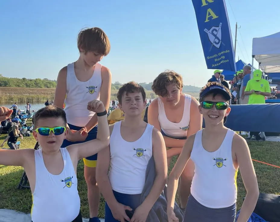 a group of women posing for a photo
