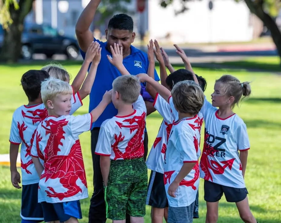 a group of kids in a line