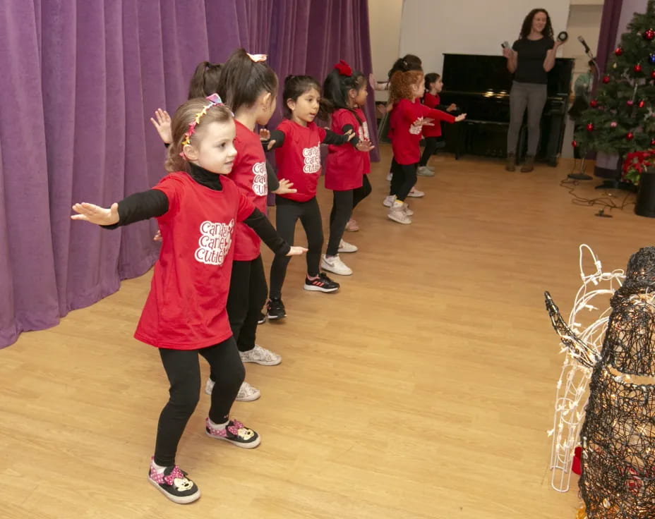 a group of children dancing